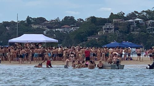 Large crowds have gathered at Lilli Pilli, south of Sydney.