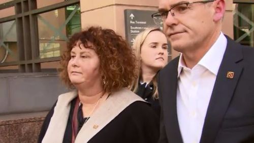 Mr Cronin's parents, Robyn and Matt, outside Melbourne Magistrates' court today.