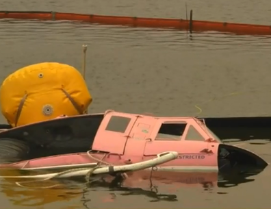 The remains of his pink waterbomber "Lucy".
