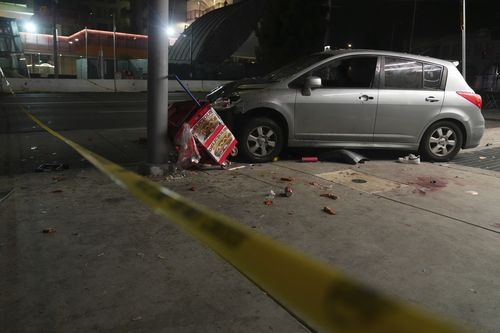 A driver rammed into a crowd of people waiting to enter a nightclub along a busy boulevard in Los Angeles