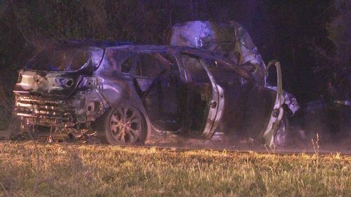 A man has been pulled from the wreck of a fiery crash by paramedics who were driving past the scene in Winston Hills.