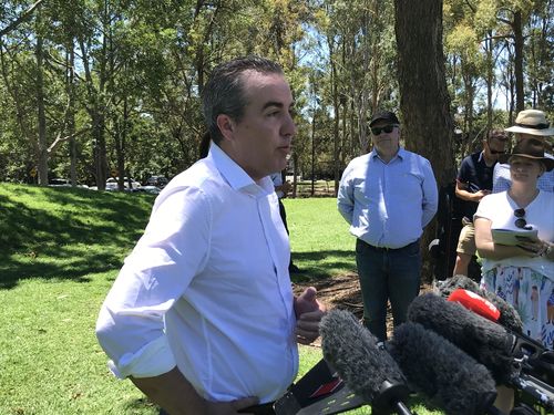 Labor's Stafford MP Jimmy Sullivan speaks with journalists after Labor's election win in October 2020.