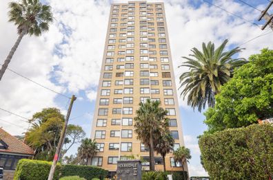 17D/50 Whaling Road in North Sydney sold for $2,427,000  despite having peeling wallpaper, a garish carpet and ancient kitchen and bathroom.