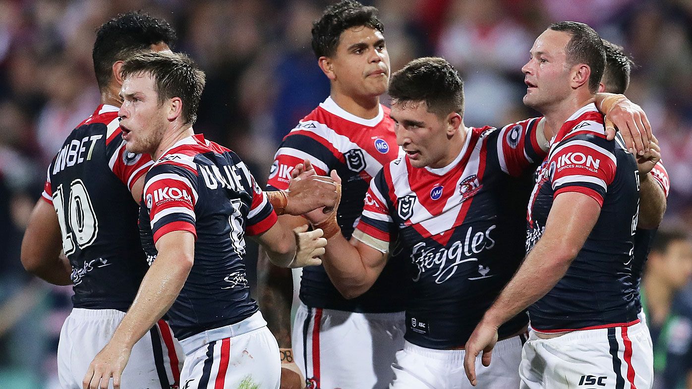 Boyd Cordner of the Roosters celebrates with team mates after scoring a try 