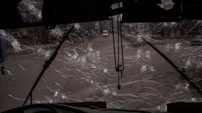 A machine-gunned bus in Kyiv