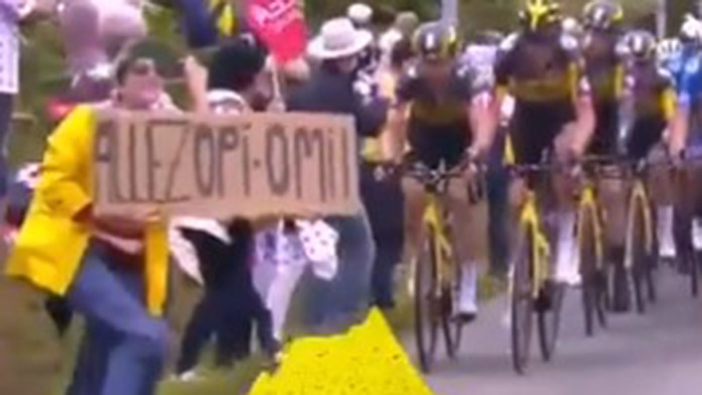 Sign-holding fan who caused massive Tour de France crash arrested, facing huge fine