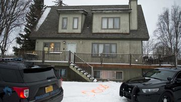 Alaska State Troopers investigate a fatal shooting scene at a home on North Valley Way in Palmer, Alaska.