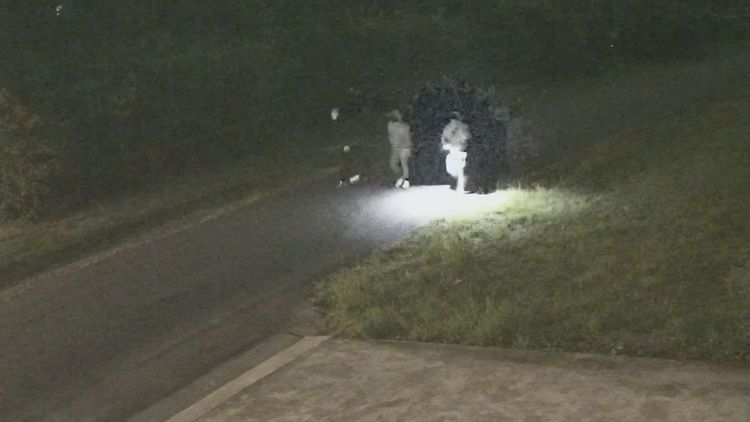 Police forensic team at the scene