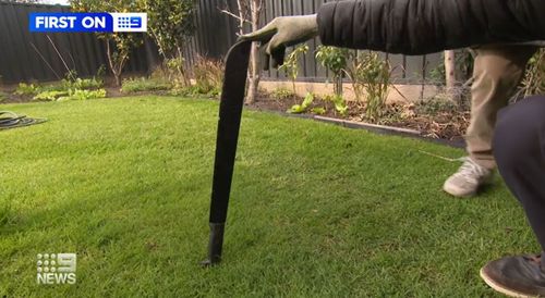 A teenage boy has escaped injury after two people allegedly chased him with machetes outside a school in Melbourne's west.
