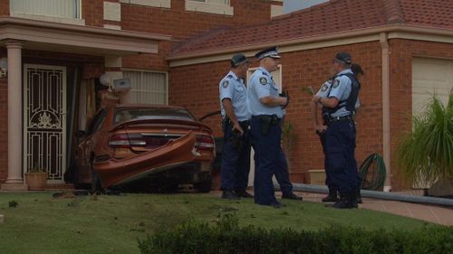 Man chases down driver who crashed into Sydney home after police pursuit