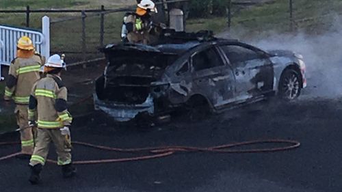 A manhunt is underway for an arsonist who torched a police patrol car in Brisbane's southside. (9NEWS)