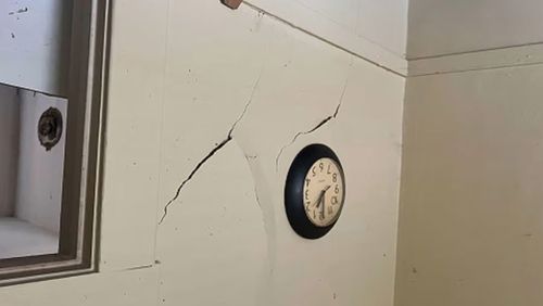 A photo supplied by Miami fire rescue appeared to show cracks in the wall.