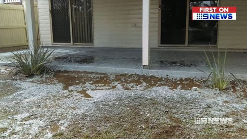 Ms Porter's home and backyard were left covered in stripped paint. (9NEWS)