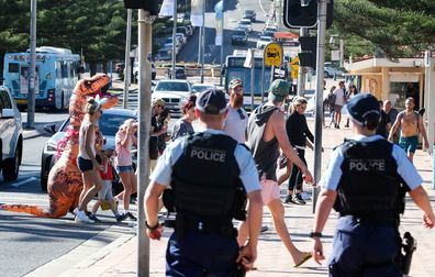 Police in Sydney patron Coogee Beach in Sydney on Easter Sunday, April 12, 2020.