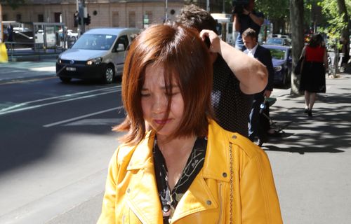 Thi Nguyen, pictured today, pleaded guilty to failing to stop and render assistance over a crash which left a young cyclist with life-threatening injuries. Picture: AAP