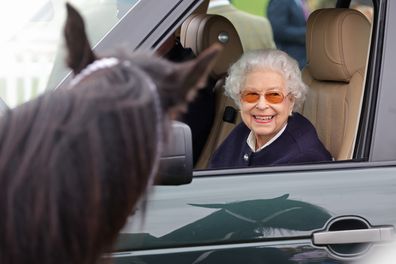 Queen Elizabeth II arrives at The Royal Windsor Horse Show at Home Park on May 13, 2022 in Windsor, England.