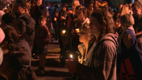 Thousands mourn the young mother's death. 