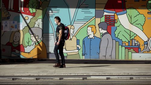 Commuters in the nearly empty Sydney CBD.