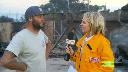 Mr Sherlock choked back tears today while talking about the devastation to Tathra as a result of the catastrophic blaze. Picture: 9NEWS.