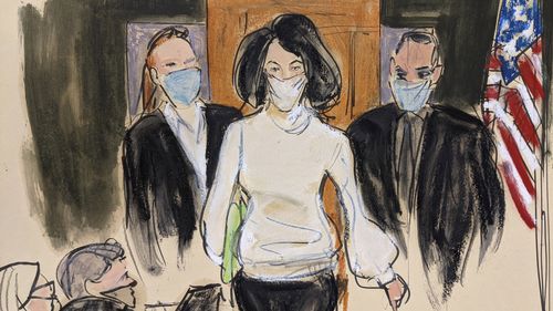 FILE In this courtroom sketch, Ghislaine Maxwell enters the courtroom escorted by U.S. Marshals at the start of her trial, Nov. 29, 2021, in New York City.  Judge Alison Nathan said on Thursday, Feb. 24, 2022, she would question a juror under oath in a rare post-verdict testimony hearing about the answers he gave during jury selection for Maxwell's criminal trial. after telling the media that he did not recall being asked about any previous sexual abuse.  (AP Photo/Elizabeth Williams, File)