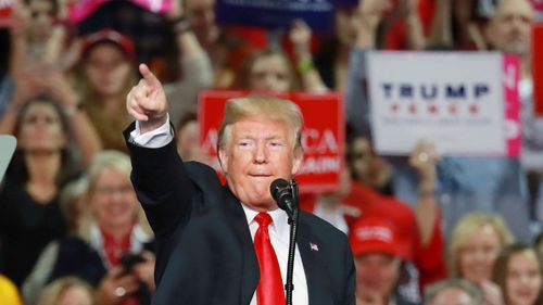 Donald Trump urges supporters to get out and vote in the midterm elections. 