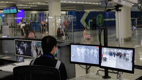 Scanners at Hong Kong airport detect if people are feverish.