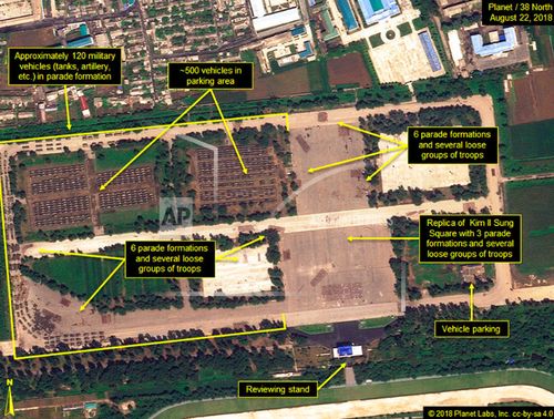 This August 22 satellite image provided by Planet/38 North shows the Mirim Parade Training Ground with approximately 120 military vehicles in parade formation and groups of troops practising on the roads and in a replica of Kim Il Sung Square.