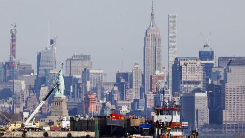 The Empire State Building dominates the New York skyline 90 years after it was built.