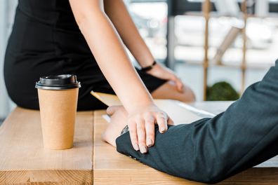 business woman flirting with colleague at office, office affair, office romance, work romance