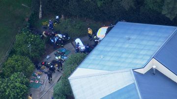 A man was trapped inside his septic tank for almost two hours in Terry Hills, NSW.