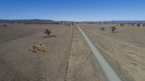 An aerial shot of Horton Rd, off Killarney Gap Road between Bingara and Narrabri, shows the extent of the drought. 