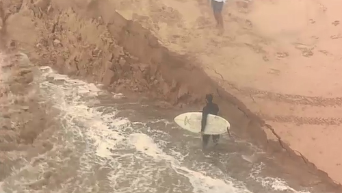 Australia weather news Sydney NSW thunderstorms hail rain winds Dee Why Beach