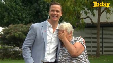Brisbane flood victim Val Simpson surprised with on air visit from singer Luke Kennedy.