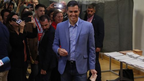 Spain's Prime Minister Pedro Sanchez prepares to cast his vote.