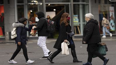 Pedestrians are seen at Bondi Junction on June 21, 2021 in Sydney, Australia. A cluster of COVID-19 cases in Sydney's eastern suburbs continues to grow, causing the government to impose restrictions including mandatory indoor mask-wearing in several jurisdictions. NSW Premier Gladys Berejiklian is urging people to get tested to stop the spread and limit further restrictions.