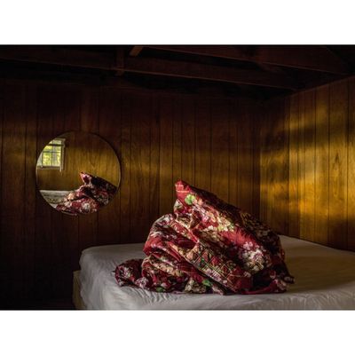 Photographer Noah Kalina used Gucci's bloom print to add to a long-running series of images he's published under the hashtag #bedmound. Talk about bedding goals.