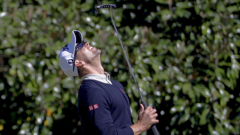 Adam Scott after one of his near misses on day two at Augusta. (AAP)