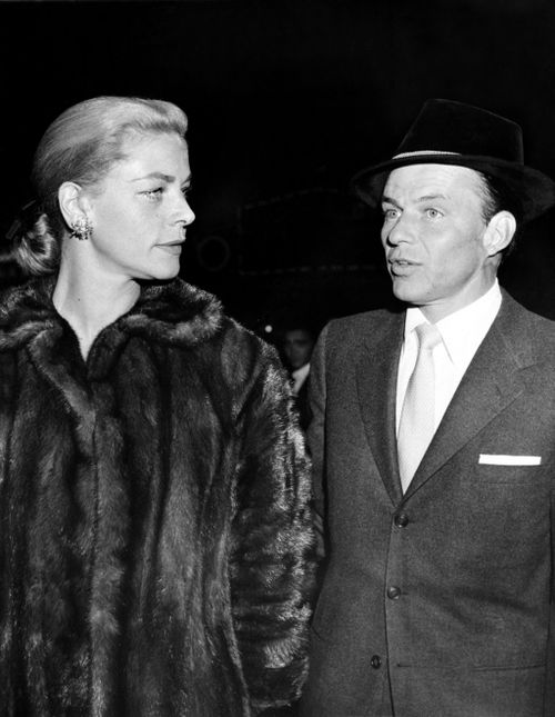 Frank Sinatra, right, and Lauren Bacall arrive at a film preview of "Pal Joey" in Hollywood, 1957. (AAP)