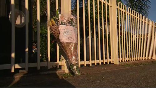 Flowers were laid outside the front of Mr Hewitt's home. Picture: 9NEWS.