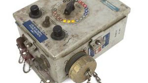 A NASA weatherproof outdoor intercom box used for communication.