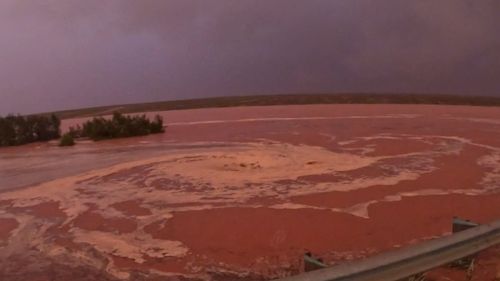 Outback towns across South Australia's flood-affected far north have been told it could be weeks before they're reconnected by road. 