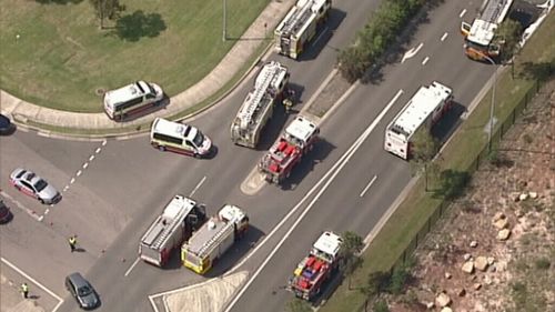 A number of emergency vehicles at the scene on Lenore Drive. (9NEWS)
