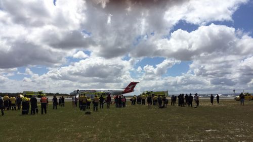 A Qantas Link aircraft was evacuated after landing at Perth Airport this morning. (Supplied)