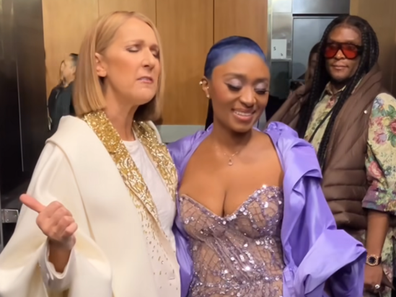 Celine Dion performs with Sonyae Elise backstage at grammys