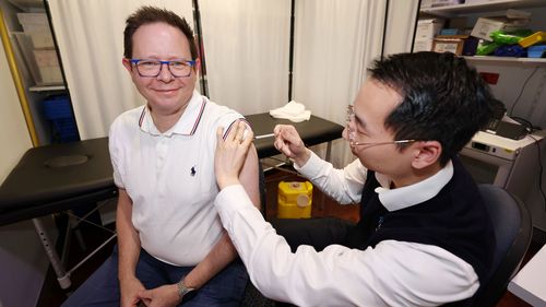 Paul Griffin gets his flu shots. 