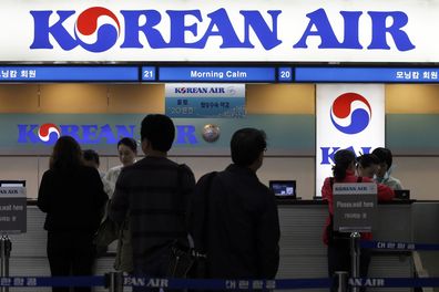 FILE - Passengers approach a Korean Air counter at Gimpo Airport in Seoul, South Korea, October 25, 2012. Cups of Shin Ramyun instant noodles, which have become a fan favorite among Korean Air travelers over the years, will no longer be available will be for Economy class passengers from August 15, 2024, a spokesperson for the Seoul-based airline confirmed. (AP Photo/Lee ​​Jin-man, File)