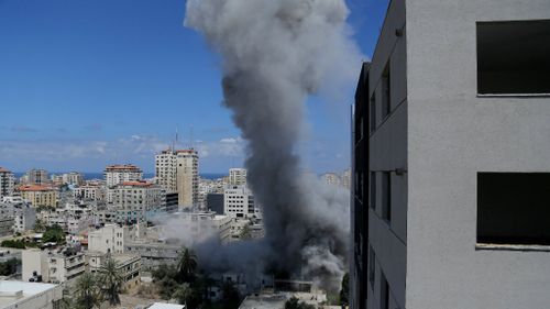 Smoke rises after an Israeli missile strike in Gaza City. (AAP)
