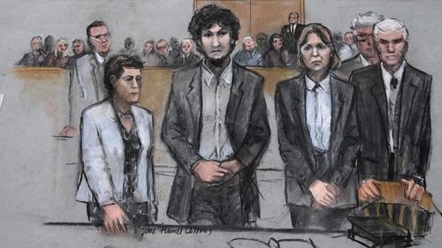 A 2015 court sketch of Boston Marathon bomber Dzhokhar Tsarnaev, center, with his defence attorneys at the Moakley Federal court house.