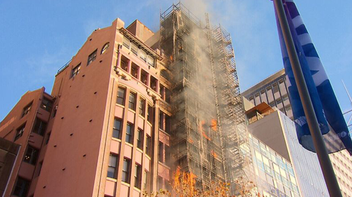 Lockhard Chambers on Macquarie Street erupted in flames only days after its cladding was removed. 