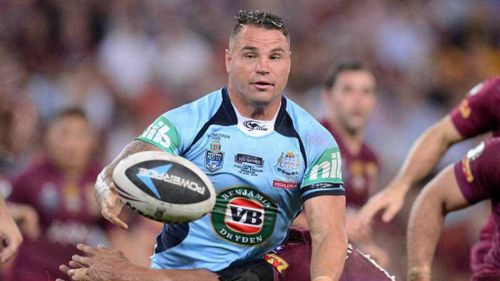 Anthony Watmough passes the ball during Game I of the 2014 State of Origin rugby league series. (AAP)